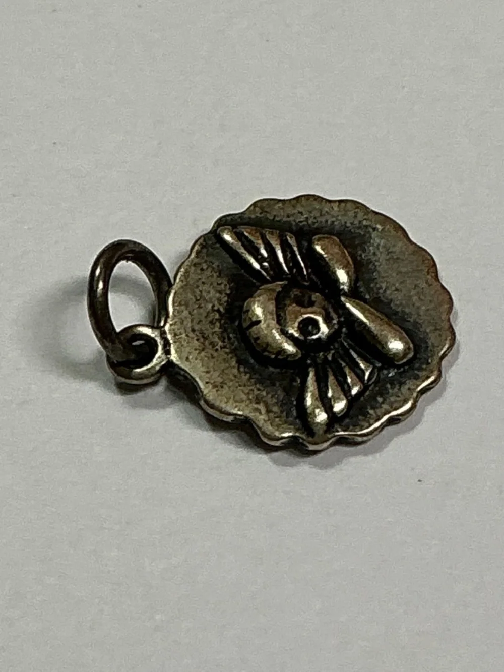 Vintage Sterling Silver JCM Guarding Angel Pendant. 1/2 inch diameter